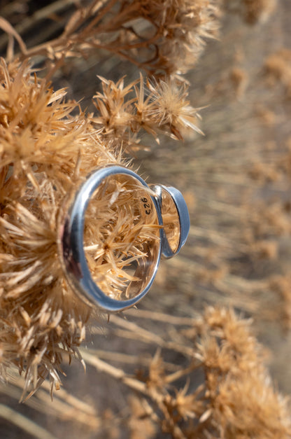 The inside of a sterling silver ring stamped 925